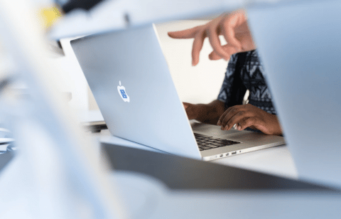 Pointing at Laptop