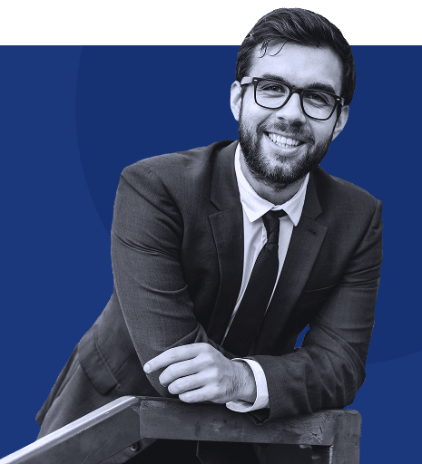 A gentleman leaning over a podium