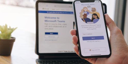 Laptop and phone showing the app for Microsoft teams