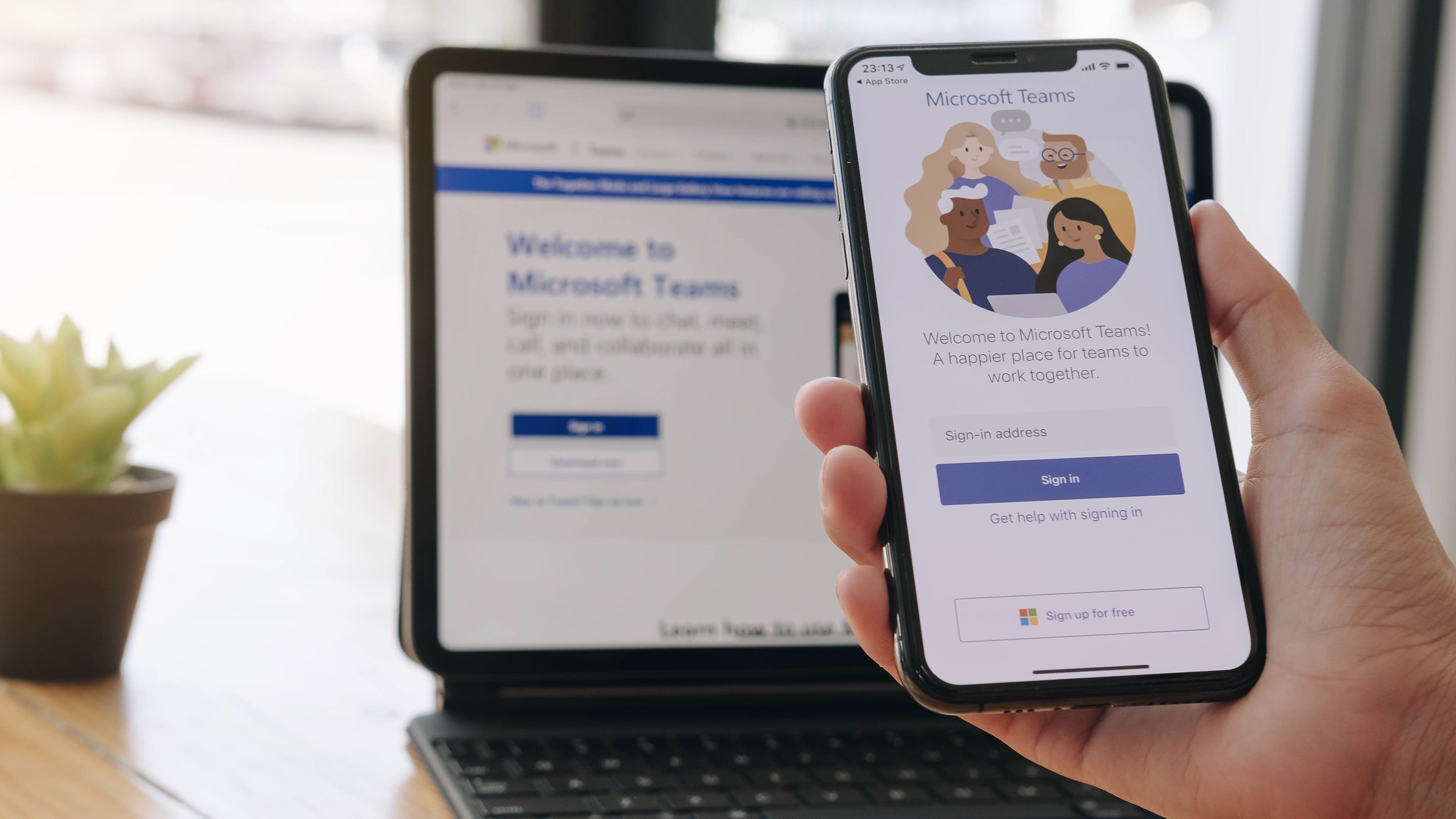 Laptop and phone showing the app for Microsoft teams