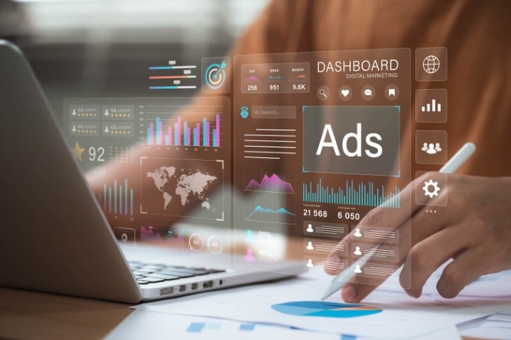 Digital advertising and marketing analytics concept. professional analyzes ad performance dashboard, showcasing customer engagement insights, social media strategy, audience targeting, ROI measurement
