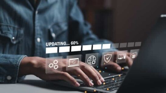 Businessman working and installing update process. Software updates or operating system upgrades to keep your device up to date with enhanced functionality in new versions and improved security.