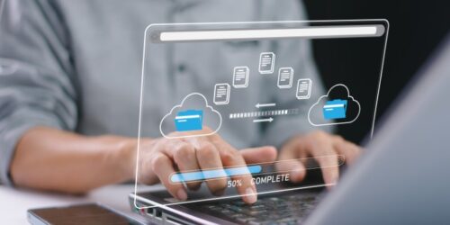 Internet cloud technology concept. Download data exchange. Transfer business folder data system relocation. Man use computer laptop waiting transfer file migration process, loading bar icon on screen