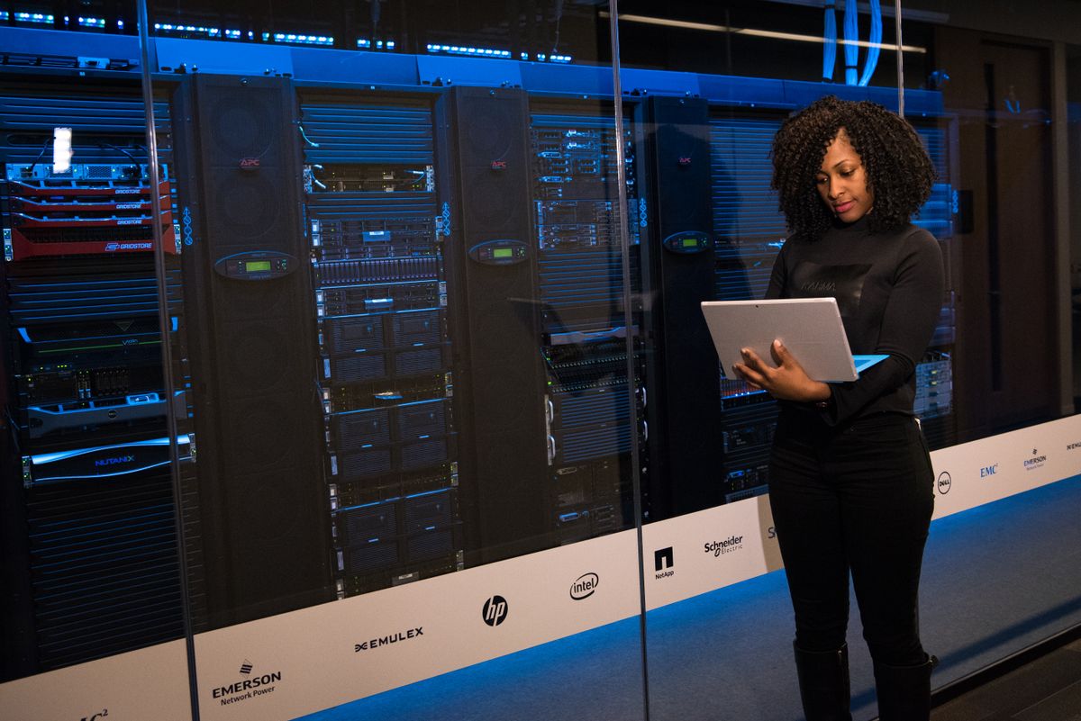Engineer monitoring data servers, representing tested backup and disaster recovery infrastructure