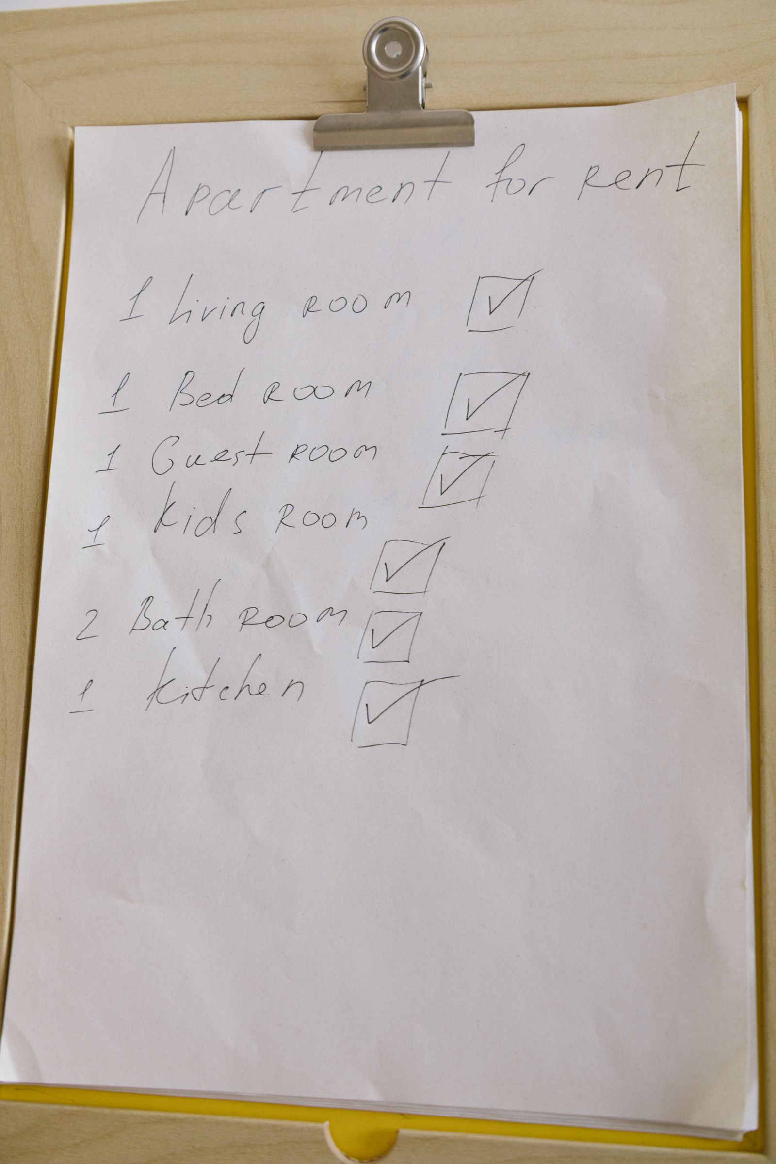 A checklist on a clipboard, representing the evaluation criteria used to vet a managed IT provider before signing