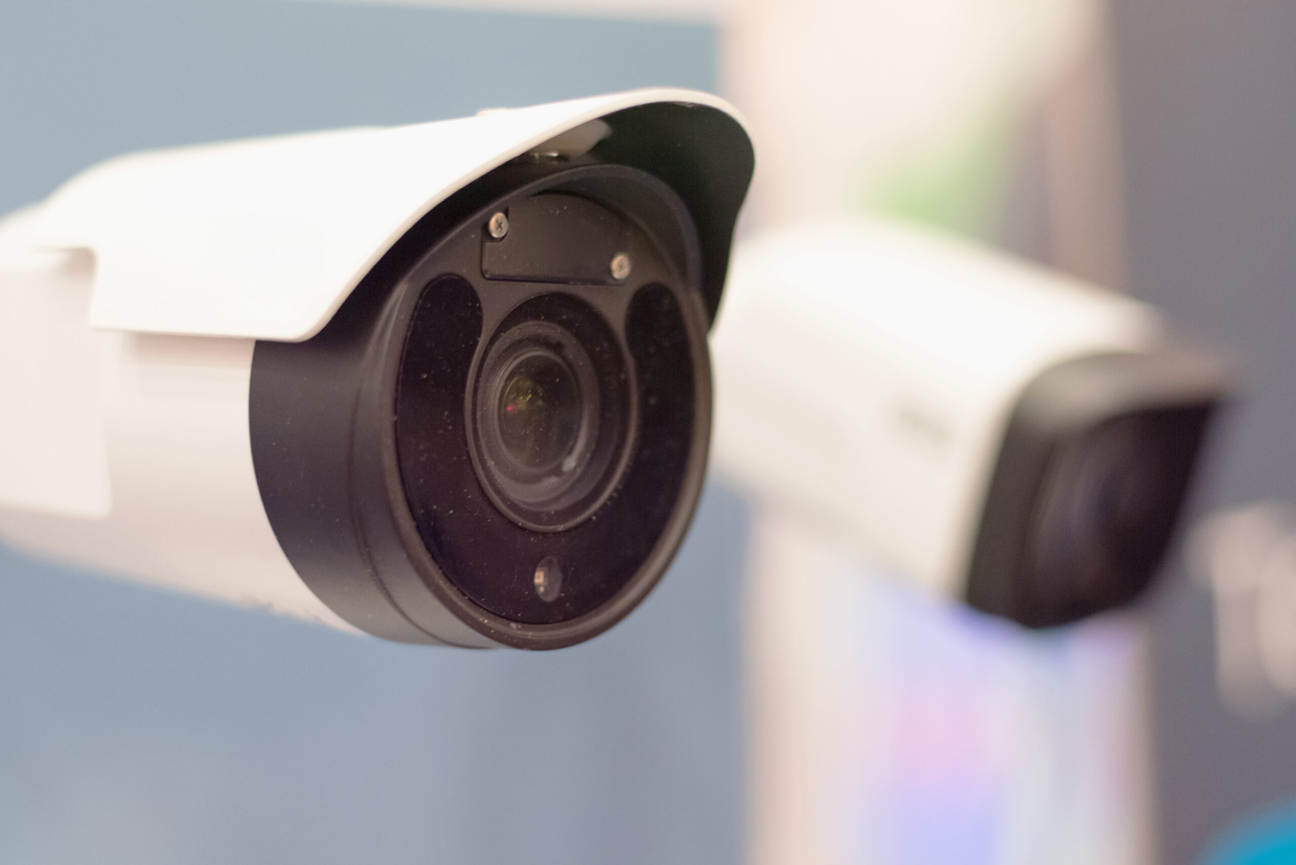 Security camera mounted in an office building, representing ACT360 security camera installation for businesses