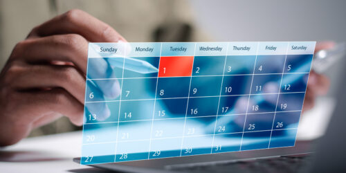 Calendar with meeting reminders, representing the 90-day review window in a managed IT agreement